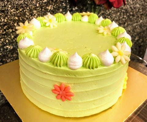 GREEN FLORA WITH WHITE ON GREEN CREAM WHOLE CAKE